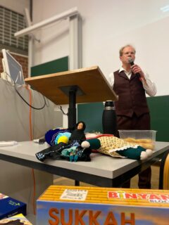 Dr. Nathanael Riemer discusses on the topic "Unboxing the Gods and Saints"