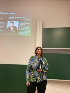 Denise Scheuerer displaying a Fulla doll